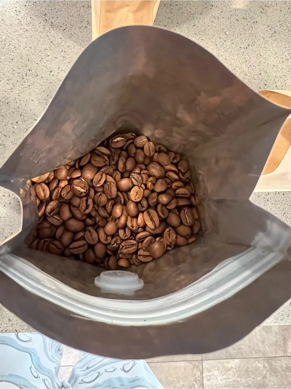 New package of medium roasted Starbucks coffee beans 9”x5”x3”